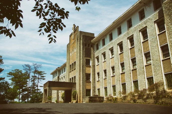 brown concrete building under blue sky during daytime
